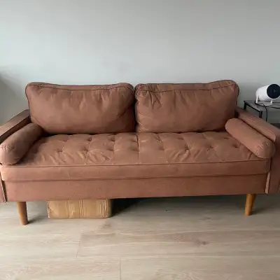 Brown faux leather sofa, View more