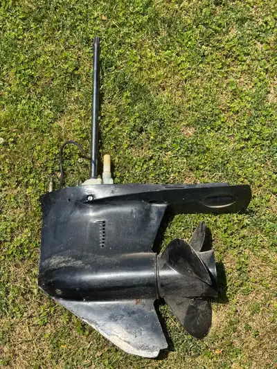 This is a used lower unit from a Mercury 135 hp outboard motor, likely from around 1990, ready to ge...