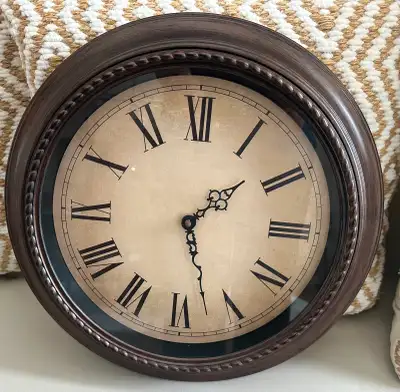 Battery operated wall clock * 16 inches diameter * runs on one AA battery * roman numerals * silent...