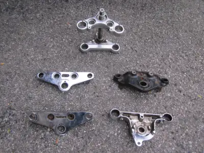 I have several triple clamps for Harley Davidson motorcycles The single clamps are $100 and the 39mm...