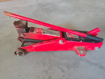 Red Motormaster Hydraulic Trolley Floor Jack. 2 ton capacity, View more