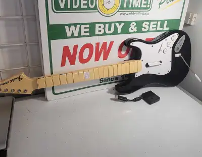 Comes with dongle, guitar turns on and plays but the buttons are a bit sticky and don't operate smoo...