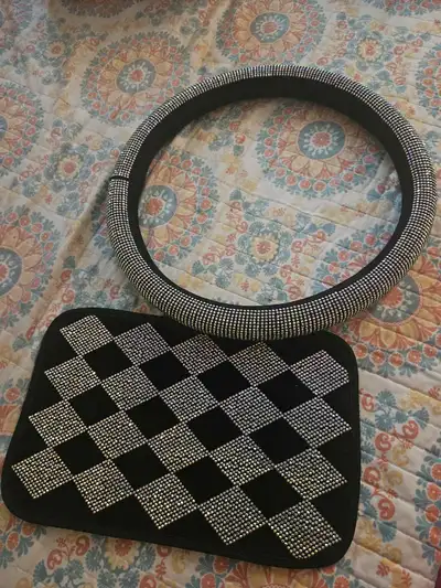 Add some bling to your ride with this dazzling steering wheel cover This used set features sparkling...