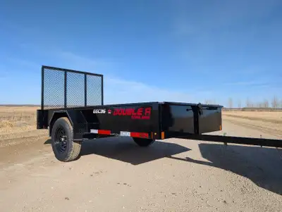 As new. Super handy easy to tow little utility trailer. 3500 lb axle with nice full width fold down...