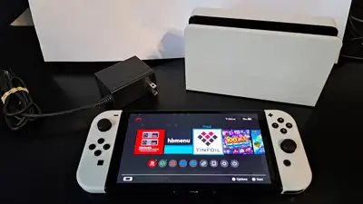 Nintendo Switch Oled with custom firmware & 50+ installed games, View more
