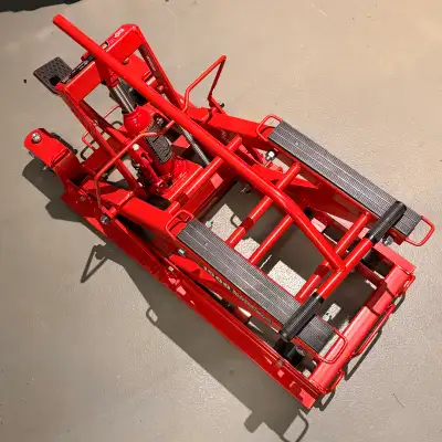 I'm offering a Big Red Torin motorcycle/ATV lift with a 1,500 lb capacity, perfect for maintenance a...