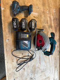 Makita 18v cordless drill/ saw with batteries