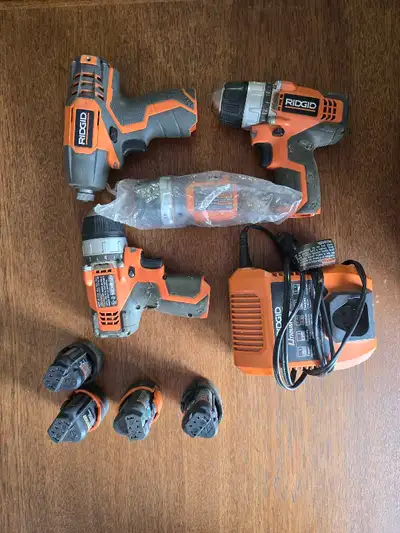 Ridgid 12v set 2 drills 1 drill driver 1 flashlight 1 charger 4 batteries Just not being used anymor...