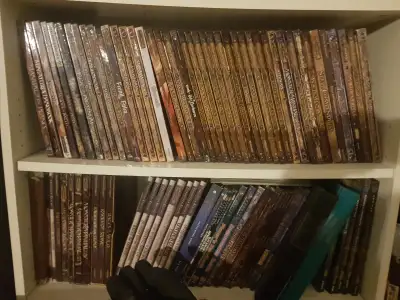 Over 50 Dungeons and Dragons edition 3.5 Hardcover Rulebooks. Also included are the leather bound Pl...