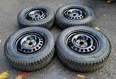 Low Kms. Set Of 4, Toyo Winter Tires 205/70/16 On 5x105 Clean Rims, Lots Of Tread, Even Wear. Only $...