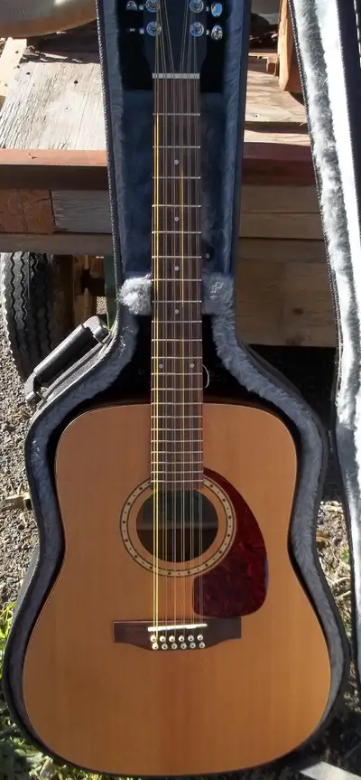SIMON and PATRICK 12 string guitar. Model S & P 12, View more