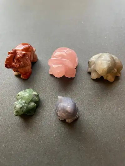 Red Jasper elephant ($15), Rose Quartz turtle ($15), Phrenite Frog ($15), Ruby in Zoisite Frog ($10)...