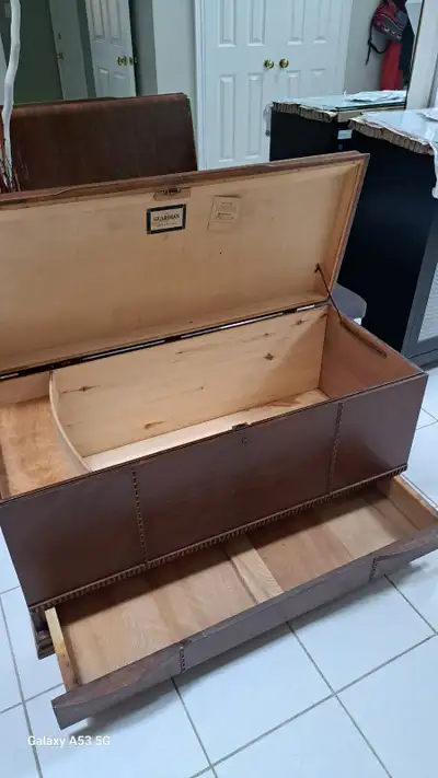 Cedar chest in good shape. Solid wood, latch and sliding drawers. Size is 44" x 18" x 24" high. Can...