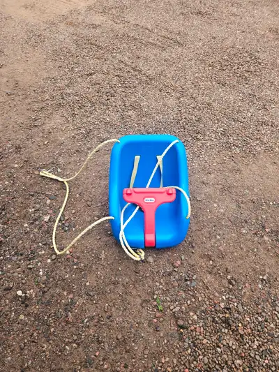 One little tikes toddler swing. In great condition eith the rope and the harness that clicks togethe...