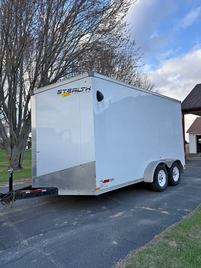 2020 Stealth enclosed trailer, very practical 7x14x7 size with V-nose, rear ramp door, and side door...