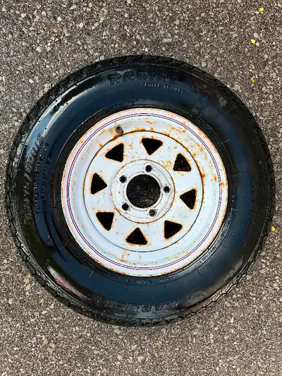 Used 13” trailer tire rim. Tire has a bulge when pumped up so no longer good. Pick up east end