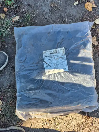 New 7 foot x 18 foot black mesh tarp. Was purchased for a dump trailer but was never used. Paid $300...