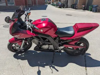 Turn-key touring bike comes with saddle bags, tank bag, winter cover, heavy chain, two bike locks an...