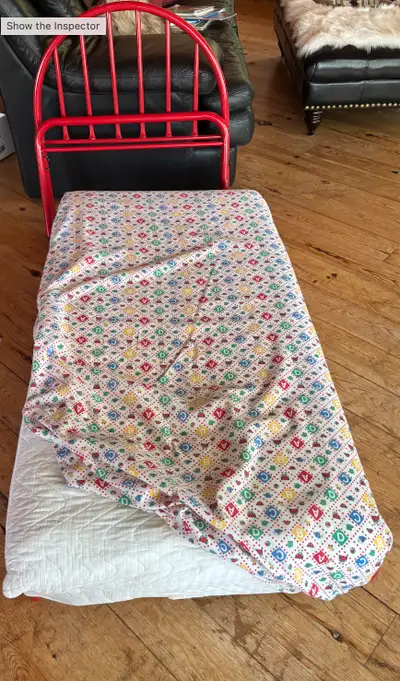 Toddler Bed frame and mattress. Includes matress cover and bed sheet. Goes together easily. All part...