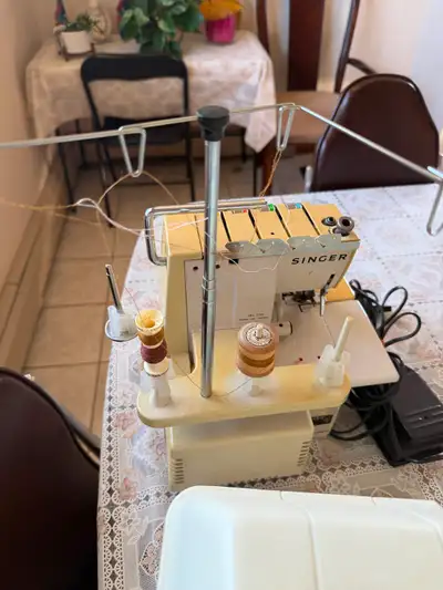 Singer 14U53A Serger, View more