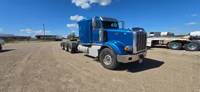 2015 peterbilt 367 tri drive paccar 850 kms 18 speed full lockers 4.10 gear fresh Sask saftey open t...