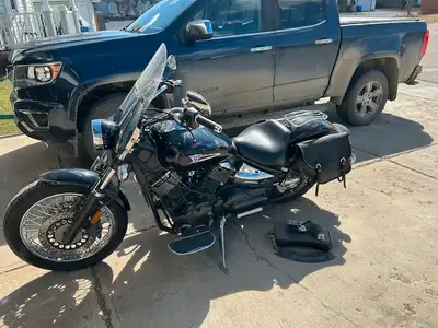 2005 Yamaha V Star 1100 Custom. Lady driven and lowered for a smaller person. Shoulder issues so can...