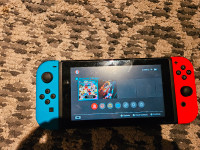 NINTENDO SWITCH WITH 2 GAMES