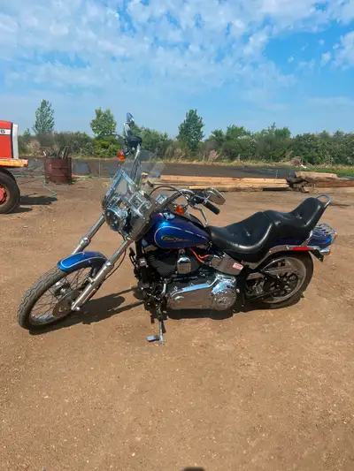 Very nice Harley soft tail with low KLM’s always stored inside heated garage.