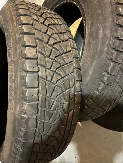 4 Alaska winter tires, size is 215/70/16 , no plugs & good treads, IMO good for another season. Was...