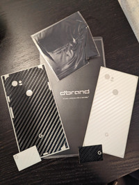 dbrand skins x2 - Black carbon fiber & white carbon fiber