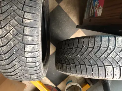 Pair of pirelli ice and snow tires. Size is 205-55/16 with about 30% remaining. Perfect for someone...