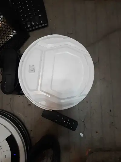Keep your floors spotless with this used Deebot robot vacuum, designed for efficient cleaning and co...