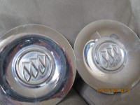 Two centre hubcaps off 2008 Buick Allure