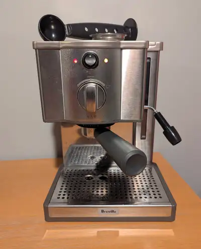This is a Breville "Cafe Roma" espresso machine. It includes a pressurized double basket, an ESE pod...