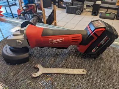 Milwaukee 2680-20 M18 Cordless Cut-Off/Grinder We are selling like new cut-off grinder with the guar...