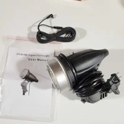 New 160w studio photography light with 2 brightness settings and flash. Mounts to standard tripods a...