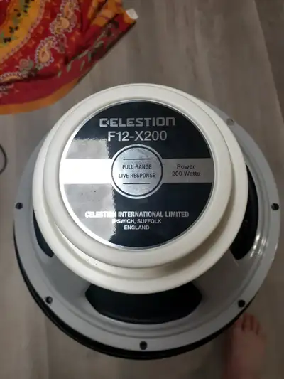 Pair of Celestion f12-x200 full range guitar speakers. 8ohms.150$ each.They are excellent for modele...