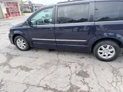 Selling my 2012 Chrysler Town & Country, a fully loaded minivan that still runs, drives, and offers...