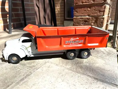 Made in Canada Pressed steel truck measures approximately 19 1/2 inches in length All original View...