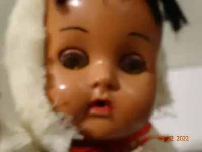 Hard plastic is much early than vinyl. This is a hard plastic brown doll , Native /Inuit , original...