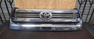 OEM chrome grille and two LED headlights. They came off the vehicle in the picture. Selling as a set...