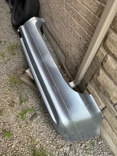 Rear bumper cover for BMW E90 or E91. This came from a 2009 BMW E91 wagon. Has some dents but can st...