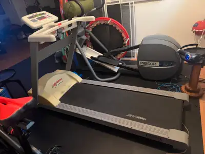 LifeFitness 5500HR Treadmill approx 77 inch long , 28 inch wide at handles, 26 inch wide at track