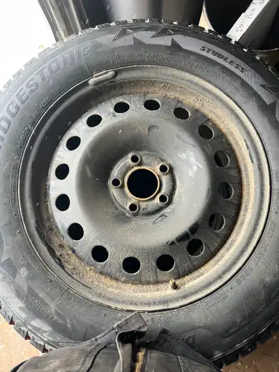 4-Bridgestone blizzaks, like new on ford steel rims with sensors for a ford escape, only sell becaus...