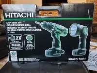 New never out of the box cordless Hitachi drill/flash light