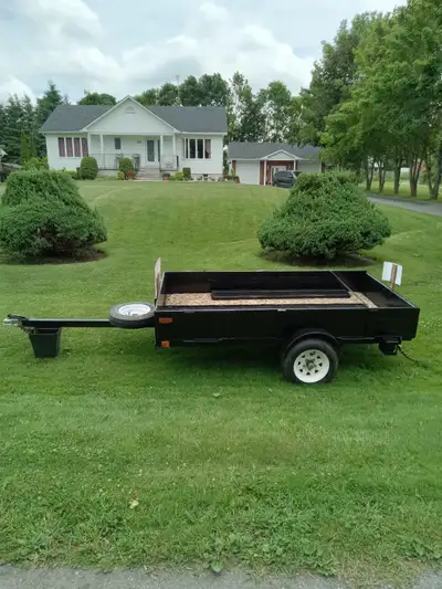 100 inch X 60 inch box trailer with tailgate, will hold entire sheet of plywood within Includes two...