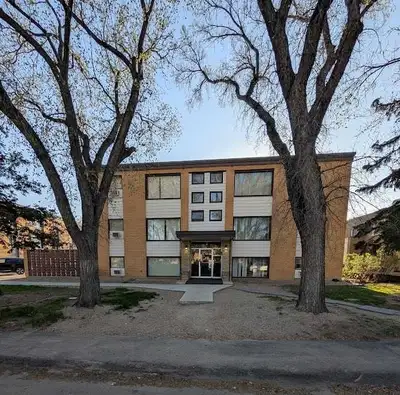 Third floor suite spacious living room with two bedrooms and full bath. Mocha finished kitchen and f...