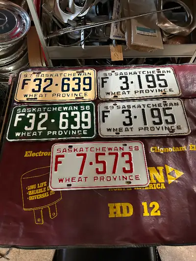 Sask. Farm license plates 1956,57,58,59 all in nice original condition. $40 each also check out my o...