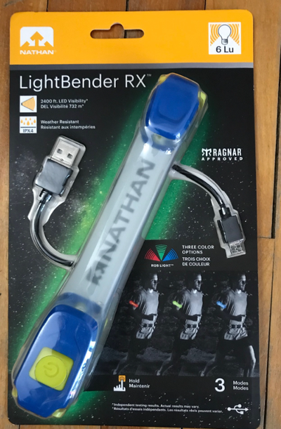 High visibility Nathan brand light band for activity in dark conditions. Adjustable size strap, flas...