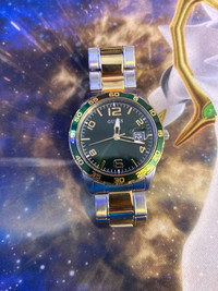Guess two toned green dial watch